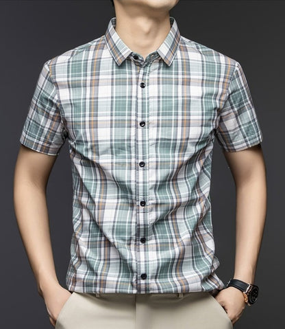 Male model wearing Sebigi green check short sleeve cotton blend shirt front view